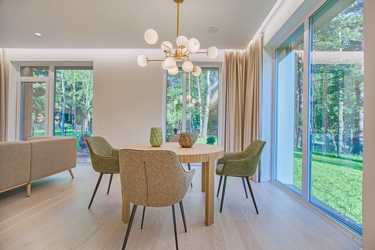 Sliding glass door in light colored dining room