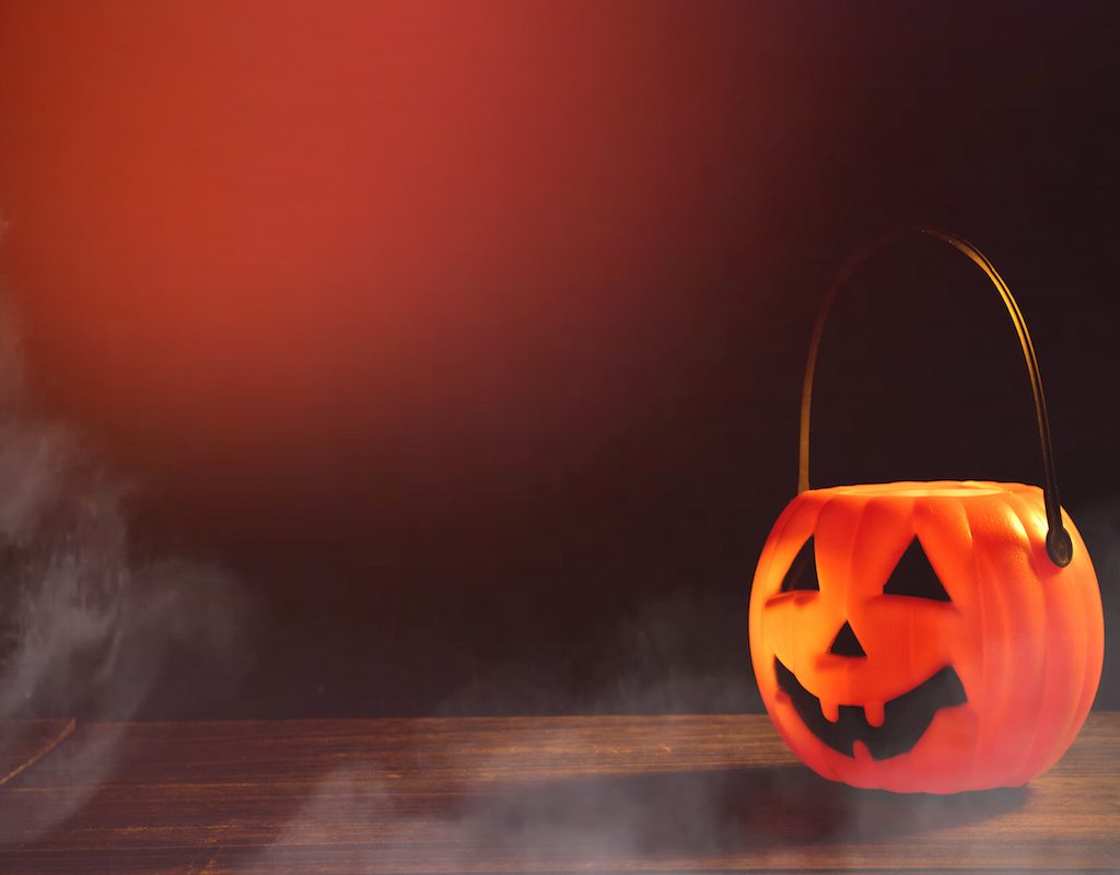 Spooky scene with plastic pumpkin