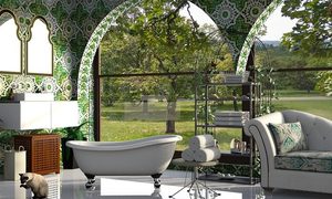 bathroom with green wallpaper, tub, and sofa