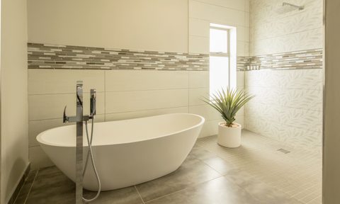 best bathroom tile ideas with bathtub and plant