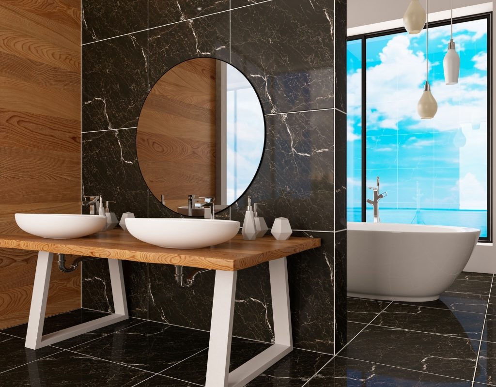 Black tiled bathroom wall with natural wood pieces