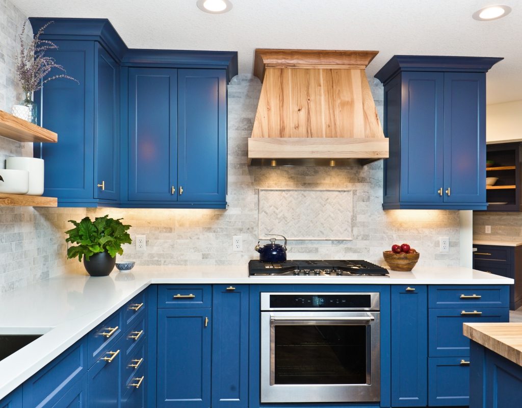 Blue kitchen cabinets redecorated after kitchen remodel