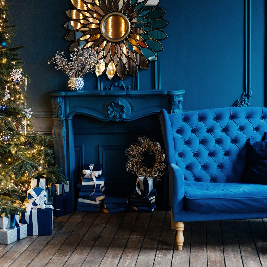 blue room design with white and gold christmas decor