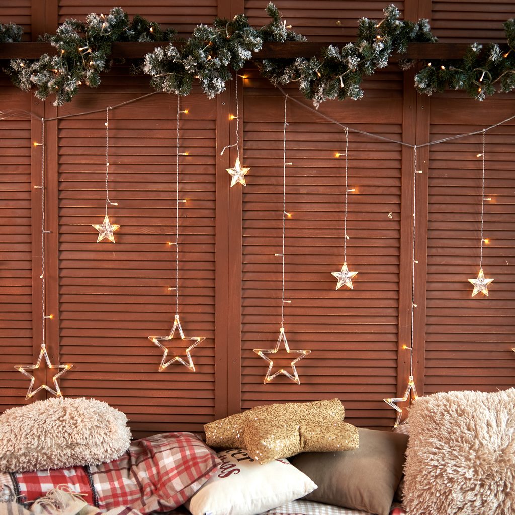 christmas star string lights on wall