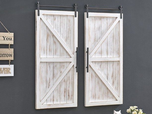 Farmhouse-style distressed barn doors dual wall plaques.
