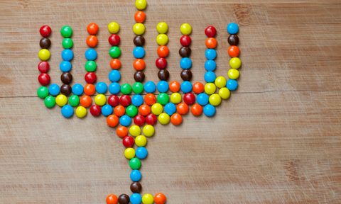 how to host hanukkah celebration chocolate candy menorah