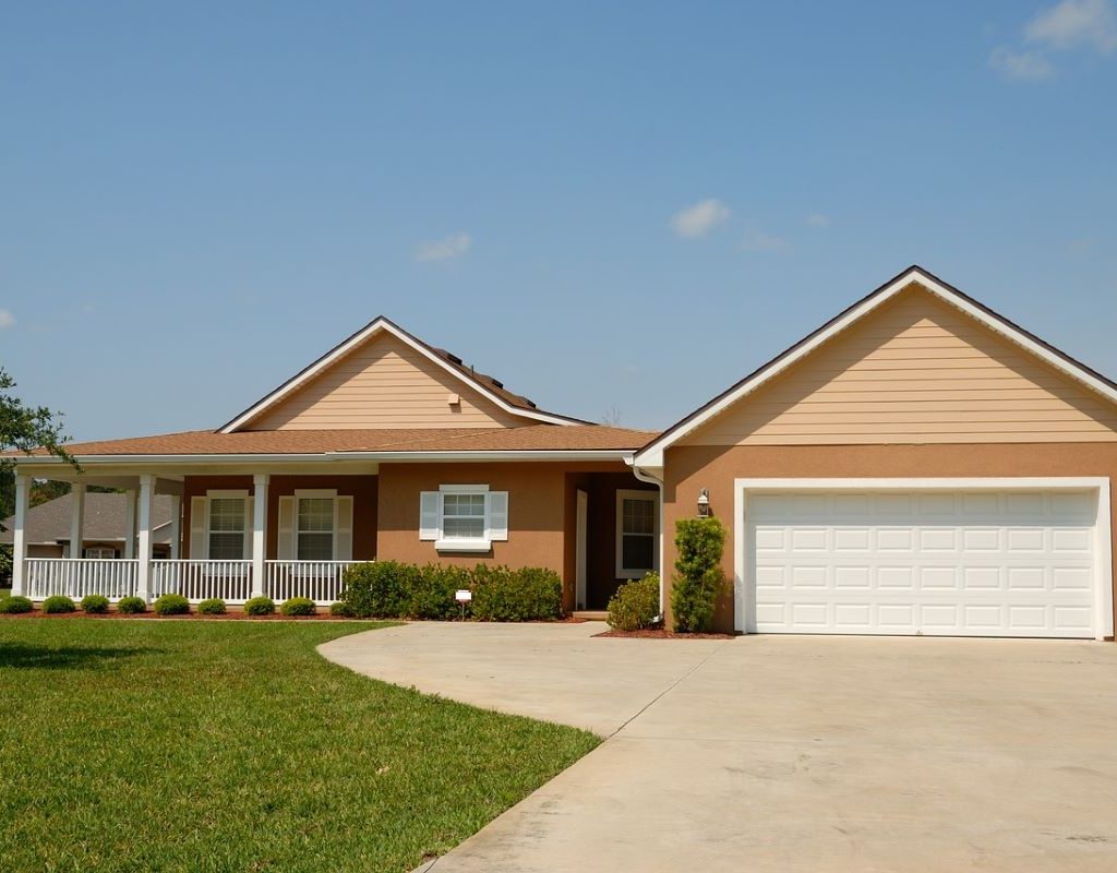 Ranch style house with nice grass