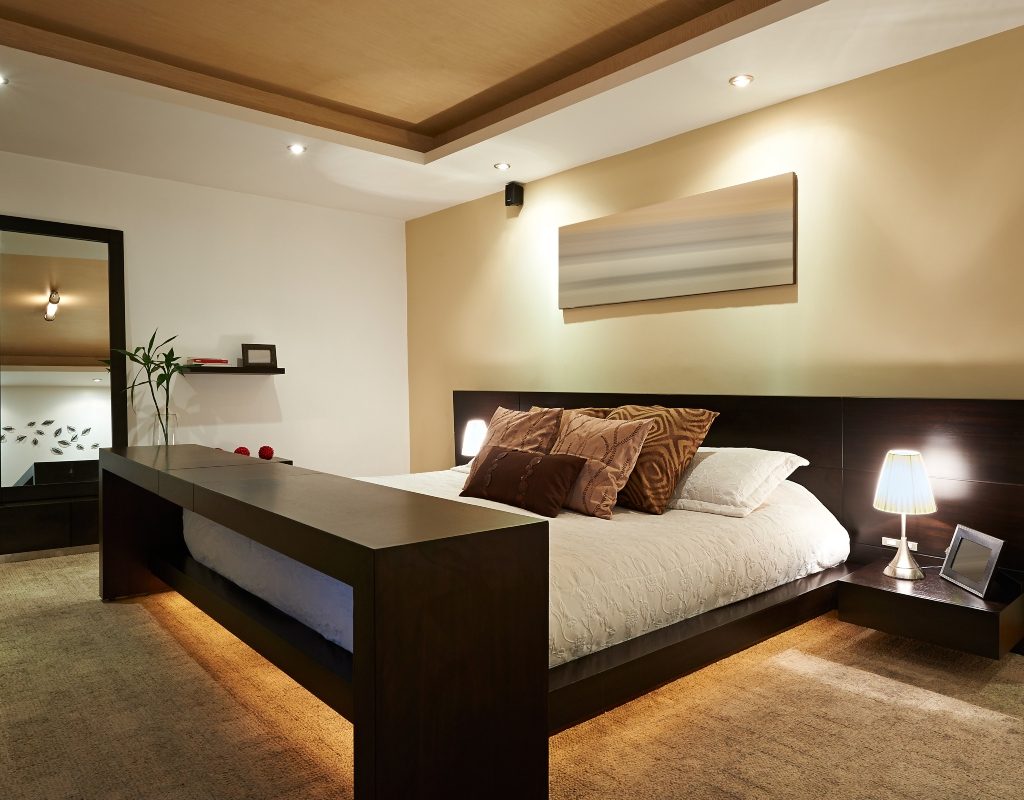 modern bedroom with under bed lighting and backlights