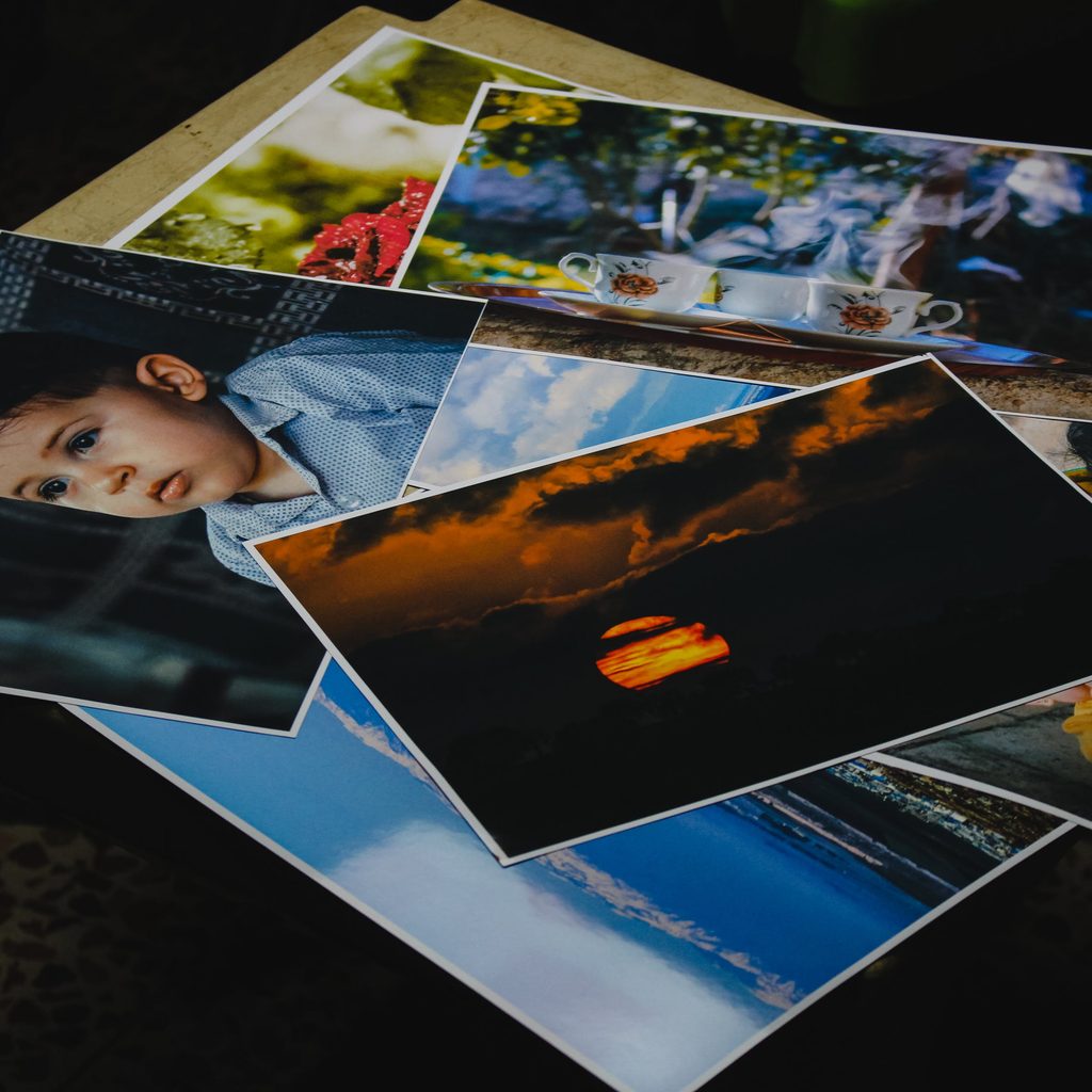 printed photos on table
