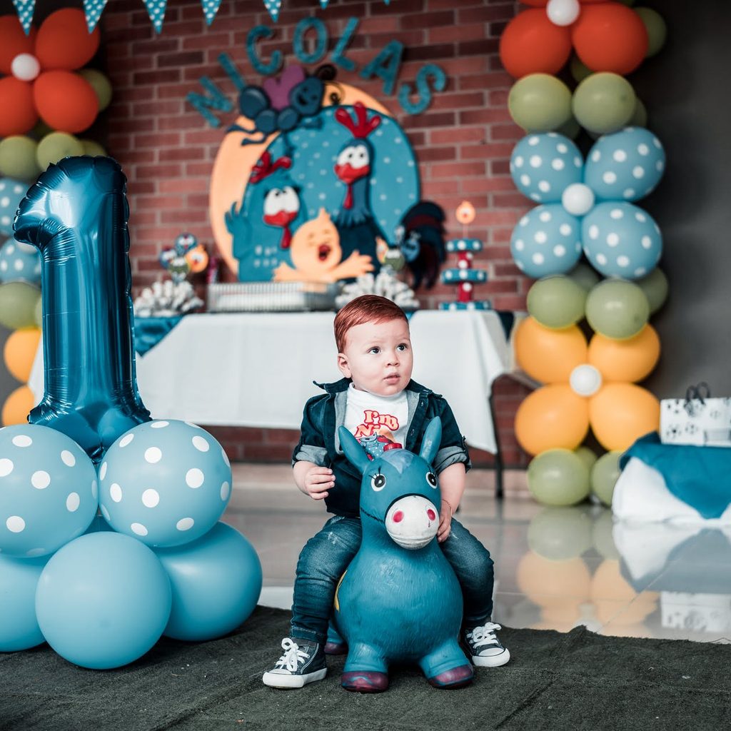 child with party decorations