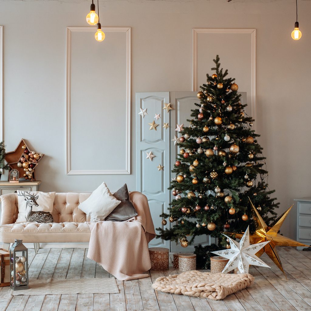 Christmas tree with stars in pastel living room