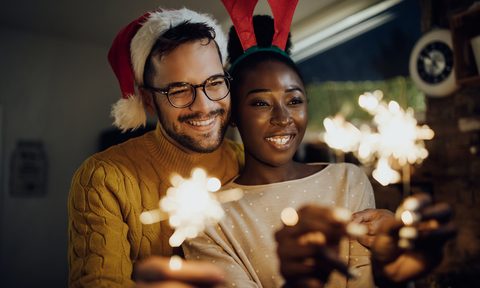 new years eve traditions couple celebrating year