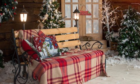 Cozy winter porch bench and decor