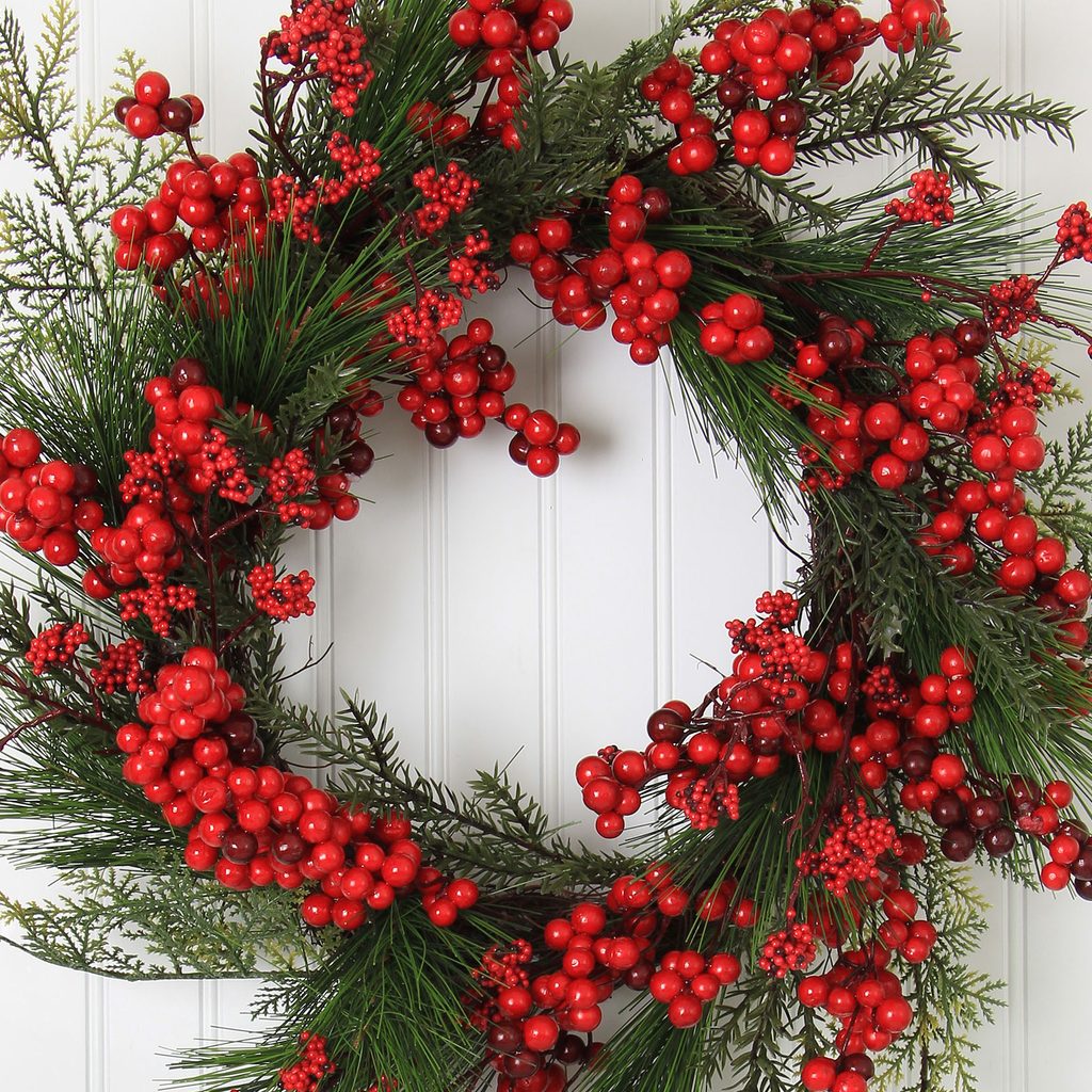 Evergreen wreath with red berries