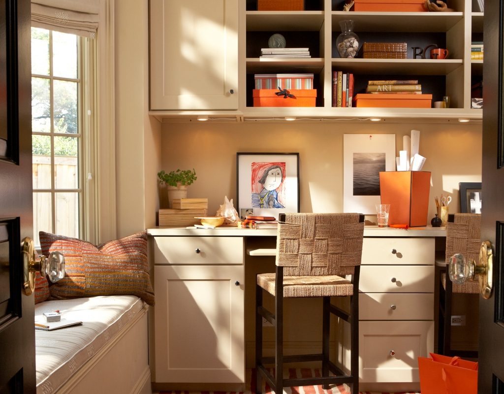 Tiny home office space with open shelving and plenty of storage