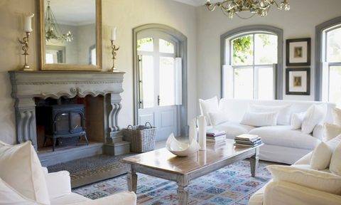 large mirror on fireplace in vintage inspired living room