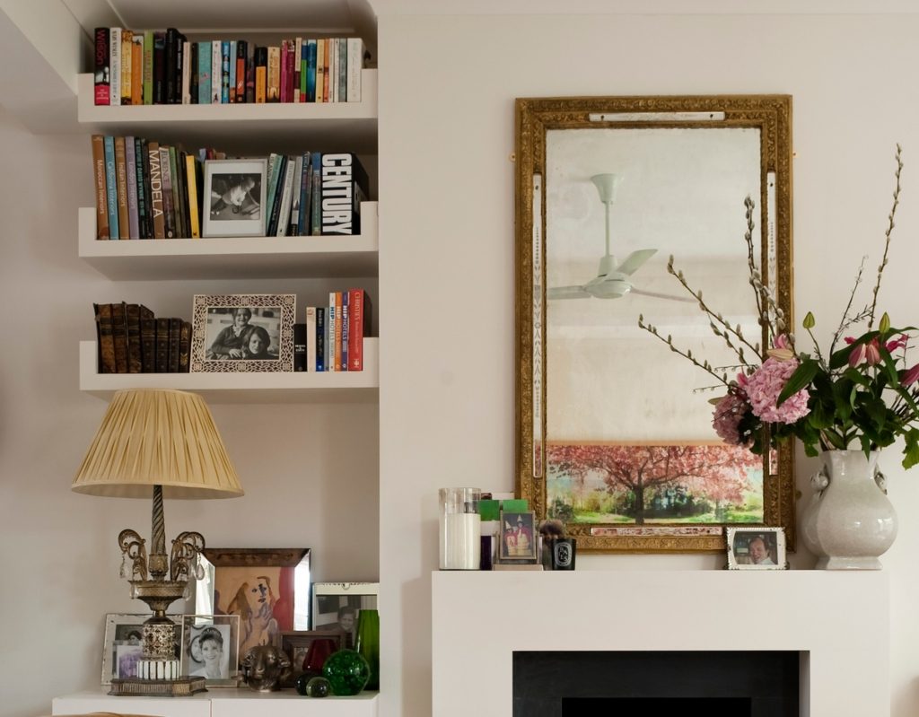 mirror and flowers on mantel for vintage design