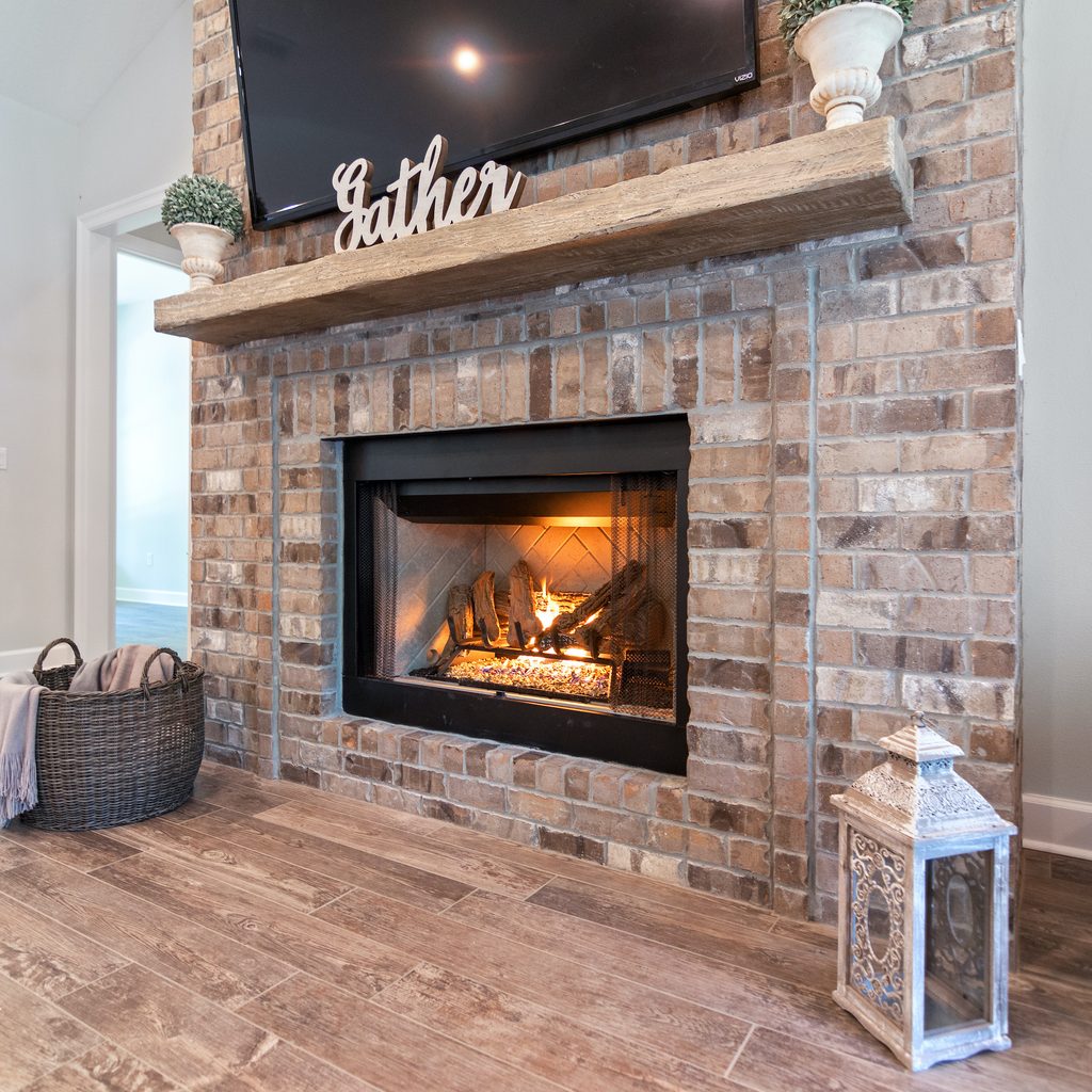 modern home with brick fireplace