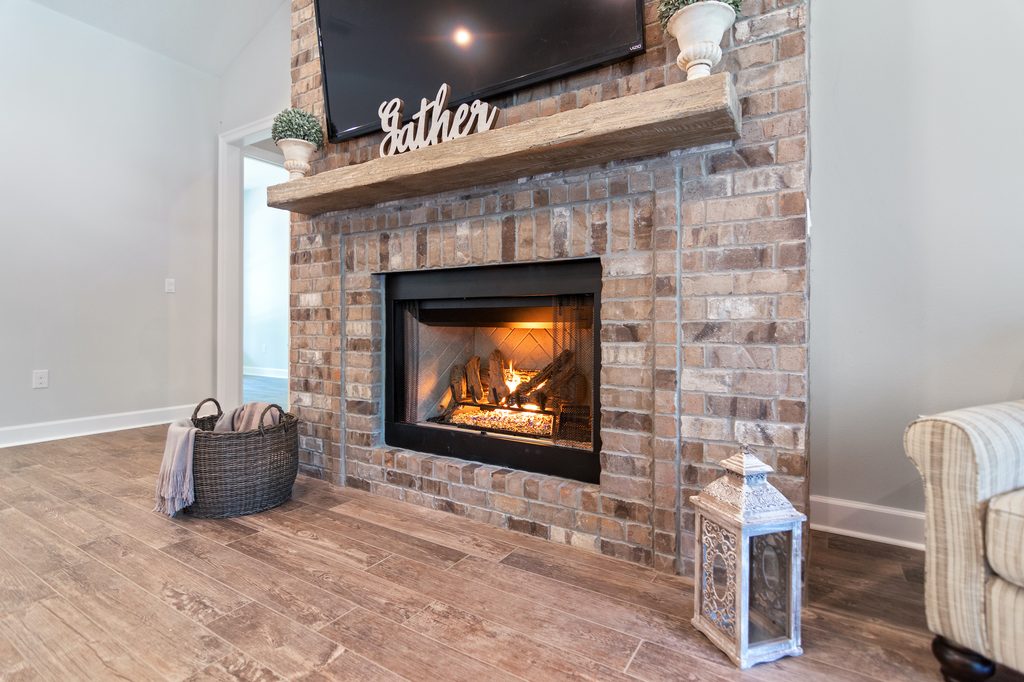 modern home with brick fireplace