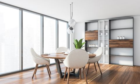 modern dining room with round chairs and table