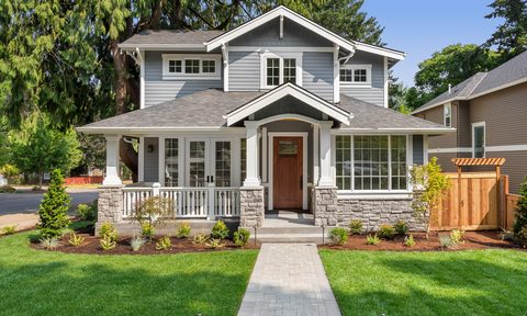 New suburban blue home with large front yard