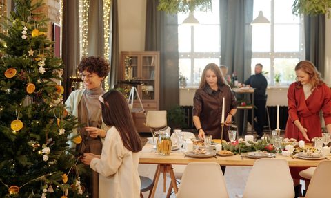 family preparing for Christmas dinner