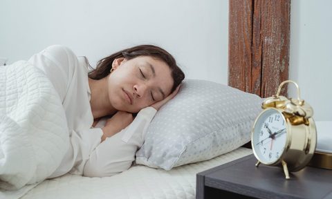 woman sleeping in bed