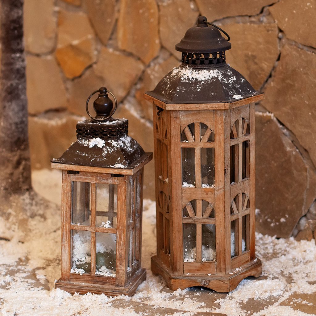 Rustic winter lanterns on porch