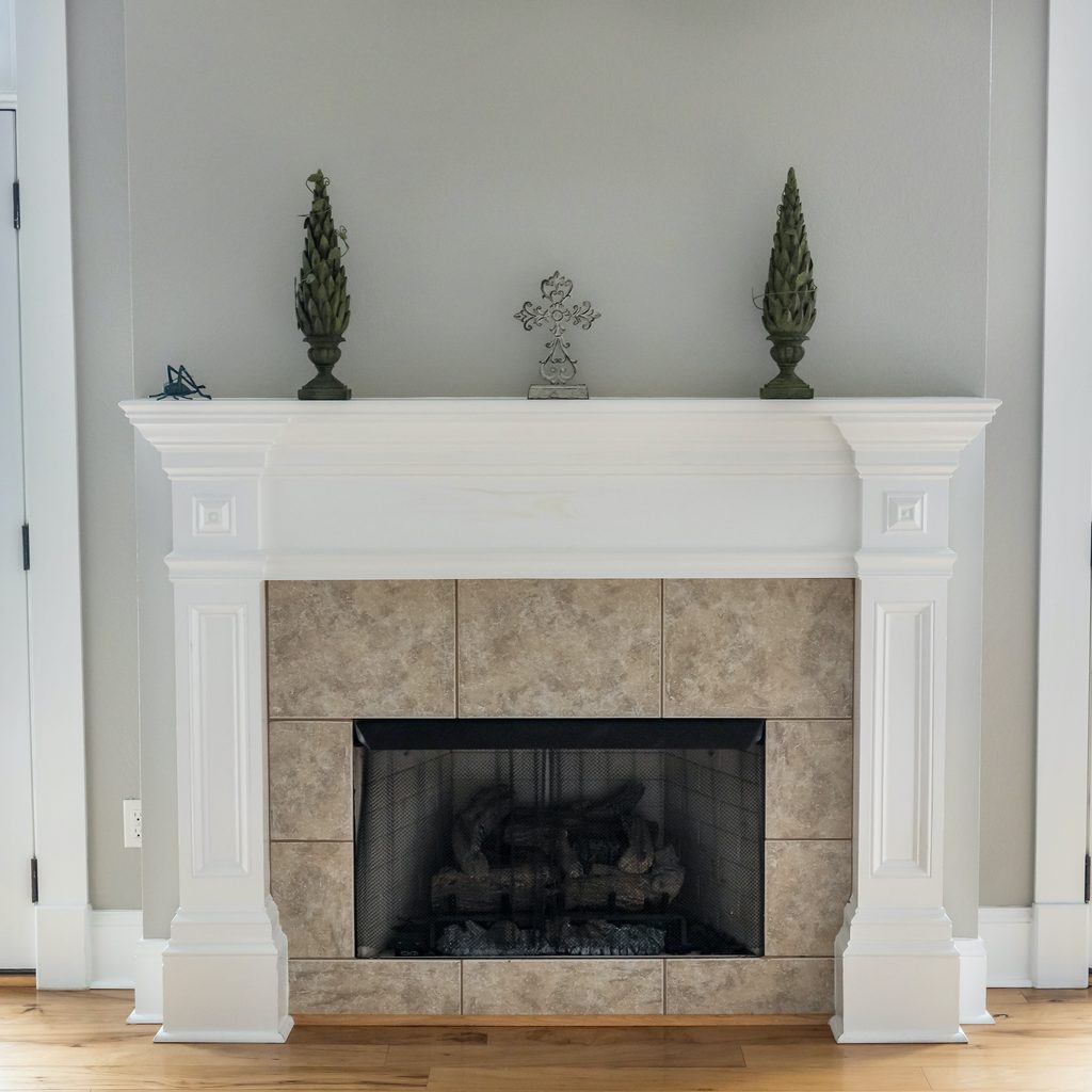 greige paint around fireplace mantel