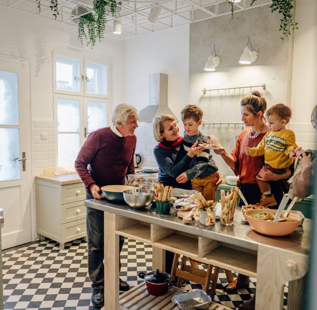 Family gathered around Thanksgiving dinner.