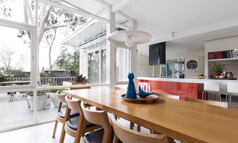 happiest home design styles scandinavian styled dining room and open plan kitchen with patio