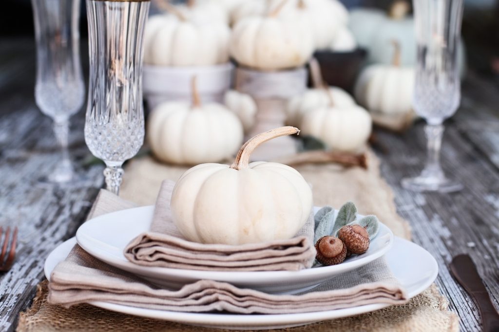 white pumpkin on plate for dining table fall decor