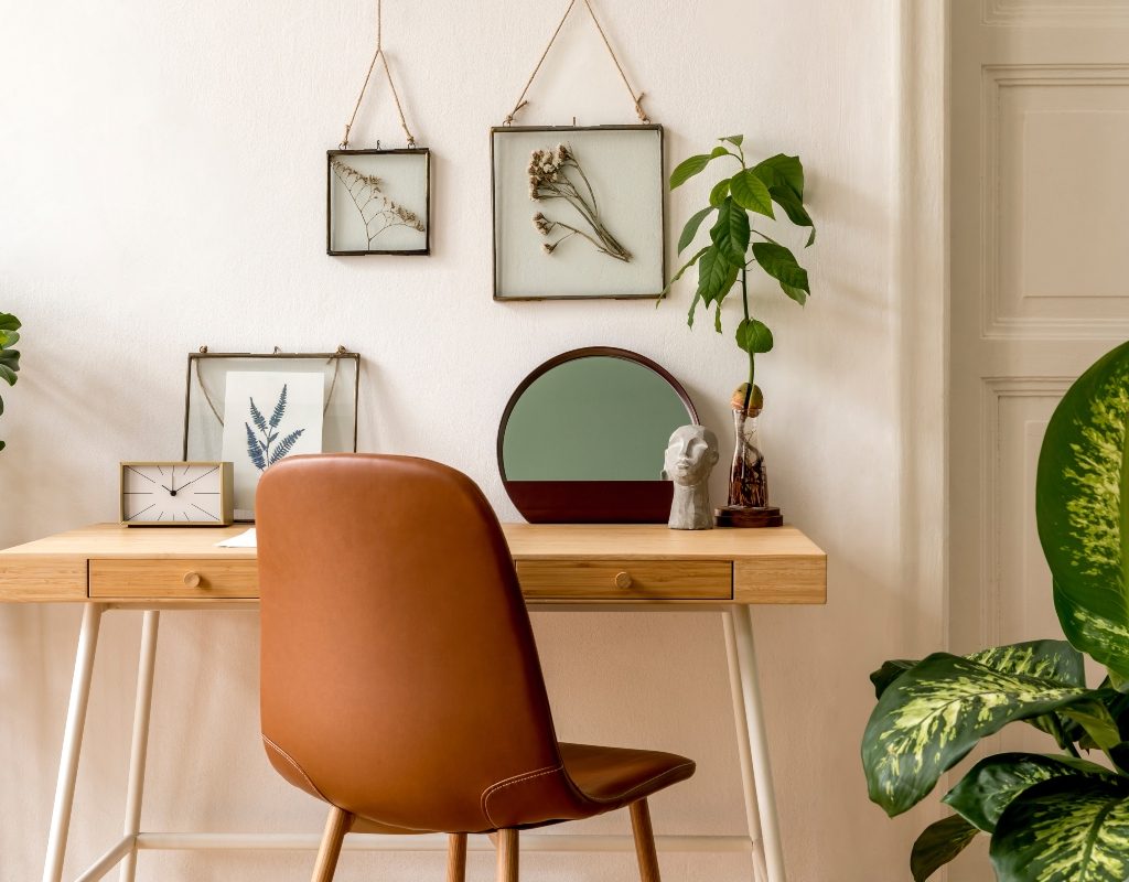 Small bohemian gallery wall with circle mirror