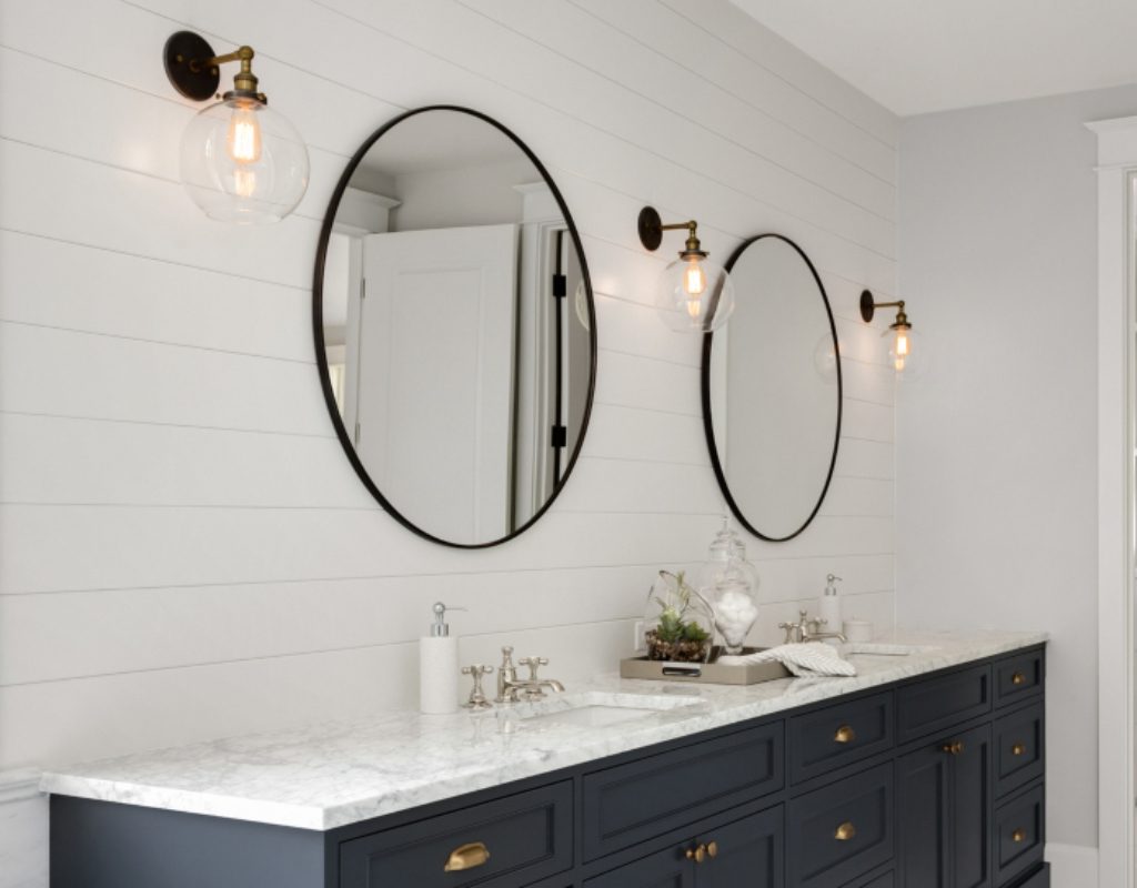 mid century modern wall sconce in modern bathroom