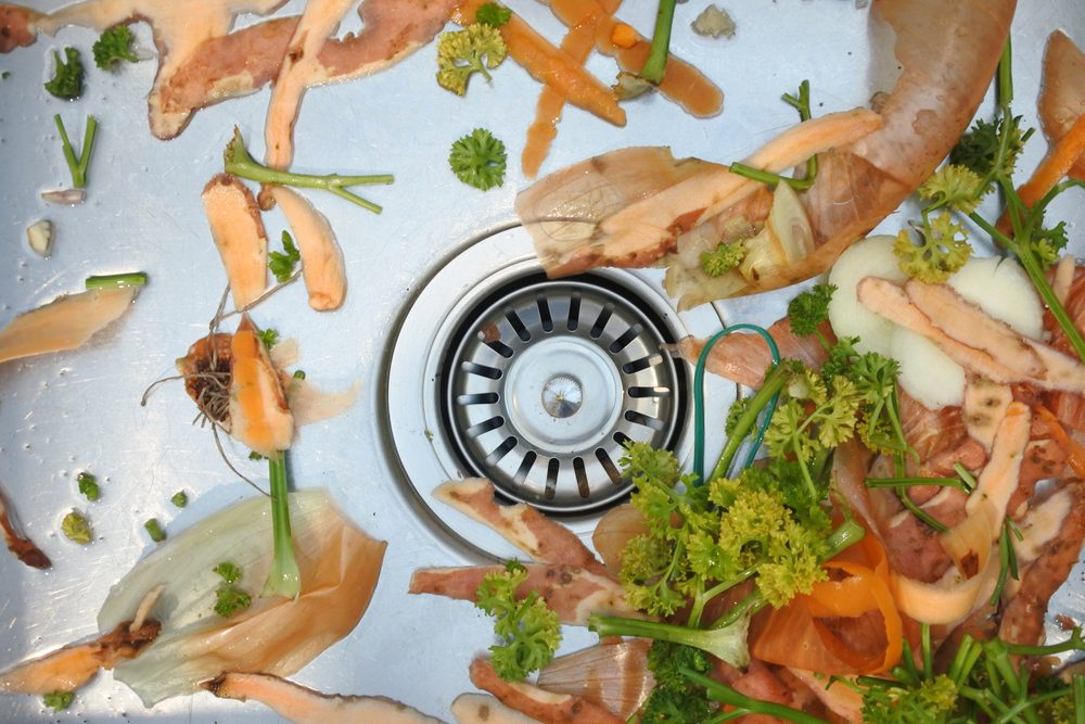Sink drain with food scraps in it