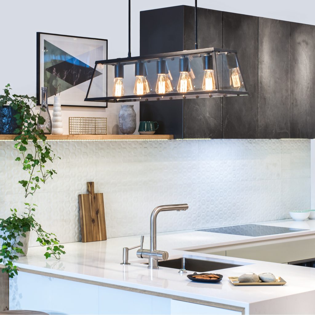 Chrome kitchen sink fixture in modern style kitchen