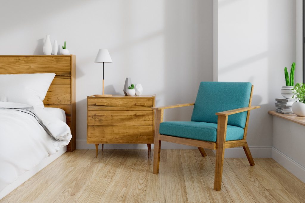 Midcentury modern chair and table in bedroom
