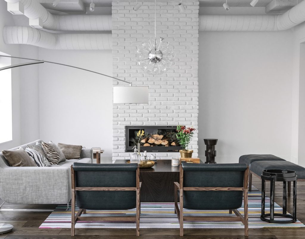 modern black and white living room with large white fireplace