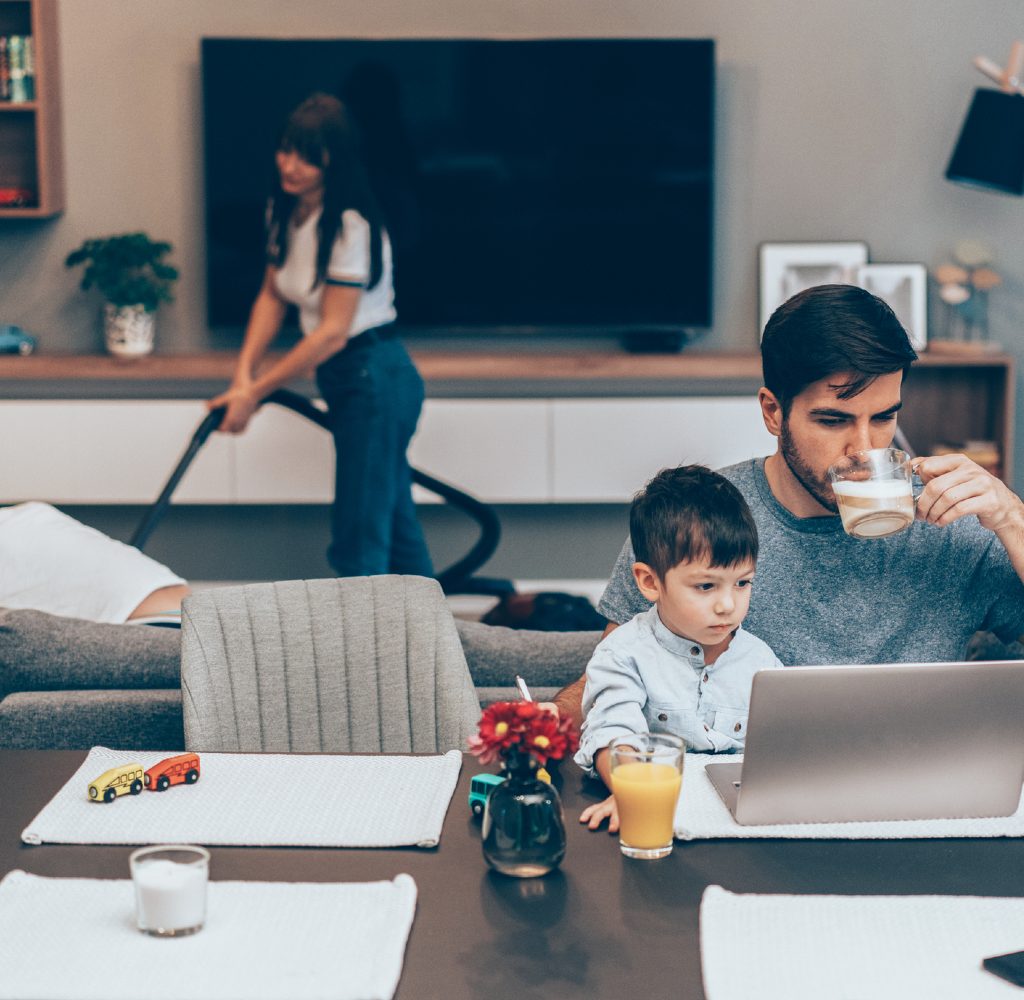 Family in home with open floorplan.