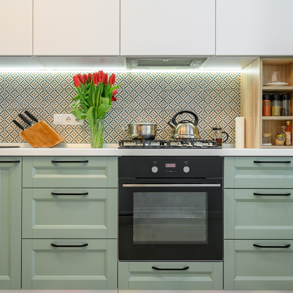 Sage green kitchen cabinets