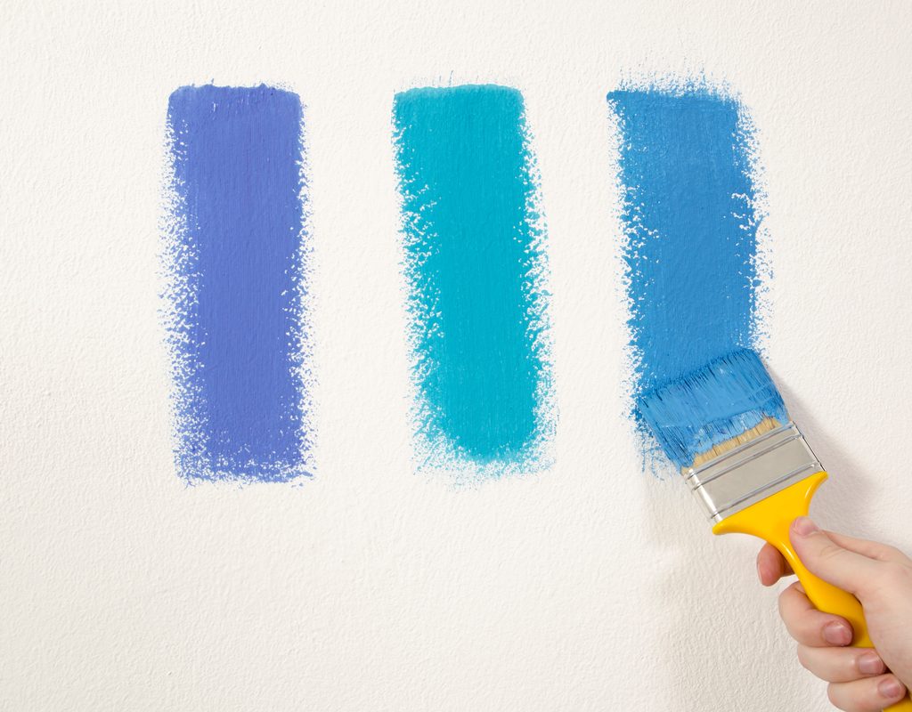 blue paint samples on white wall