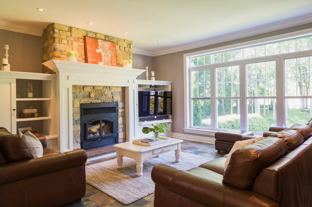 traditional living room with brick fireplace
