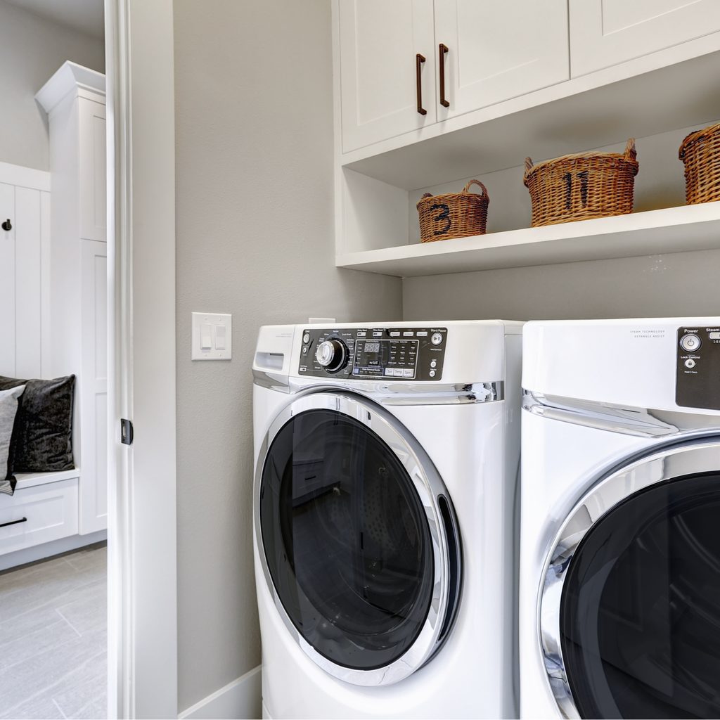 Laundry room next to mudroom