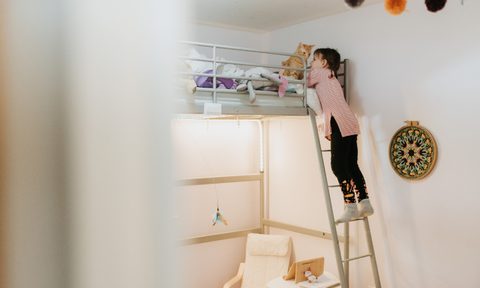 Child's loft bed with office area underneath.