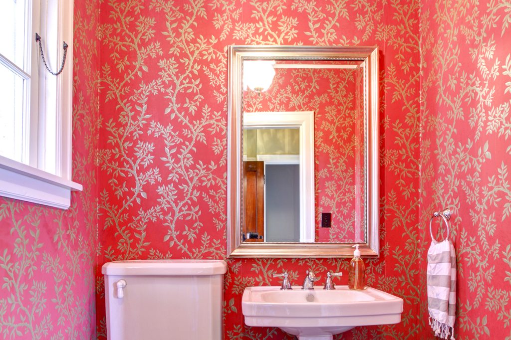 Maximalist bathroom with wallpaper