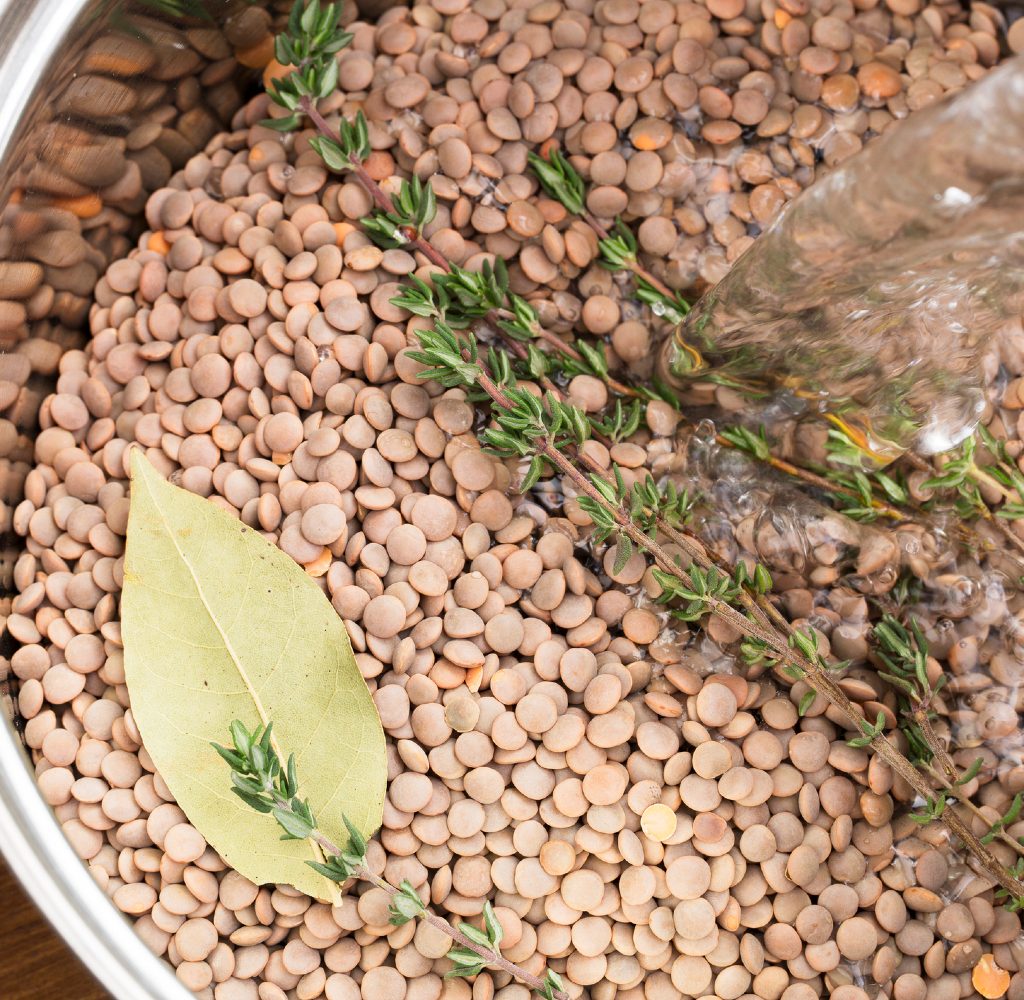 Lentil soup being prepared.