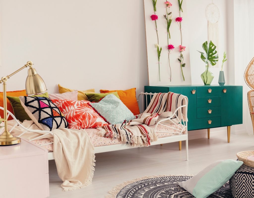 modern living room white with colorful fabrics and bold pattern