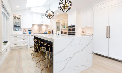 Modern white kitchen with quartz counters