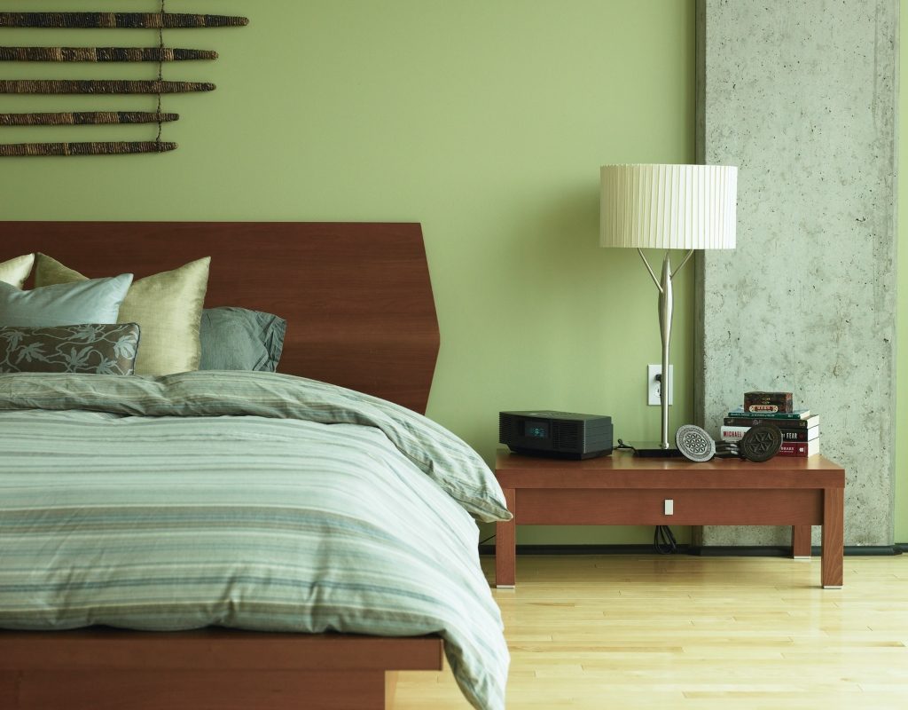 Pale green bedroom walls.