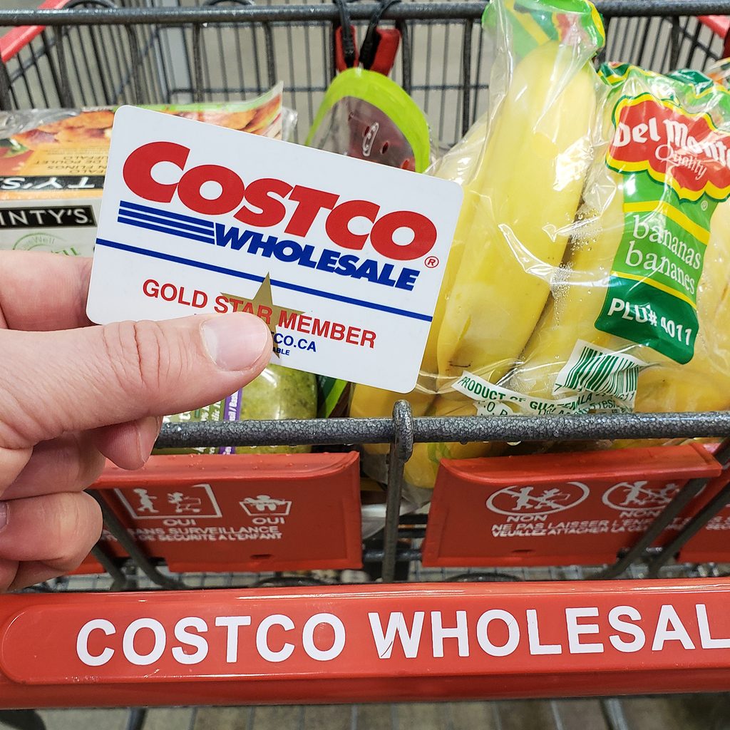 Person grocery shopping with a Costco membership